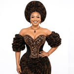 Nigerian George wedding dress, decorated stones, black and gold fabric